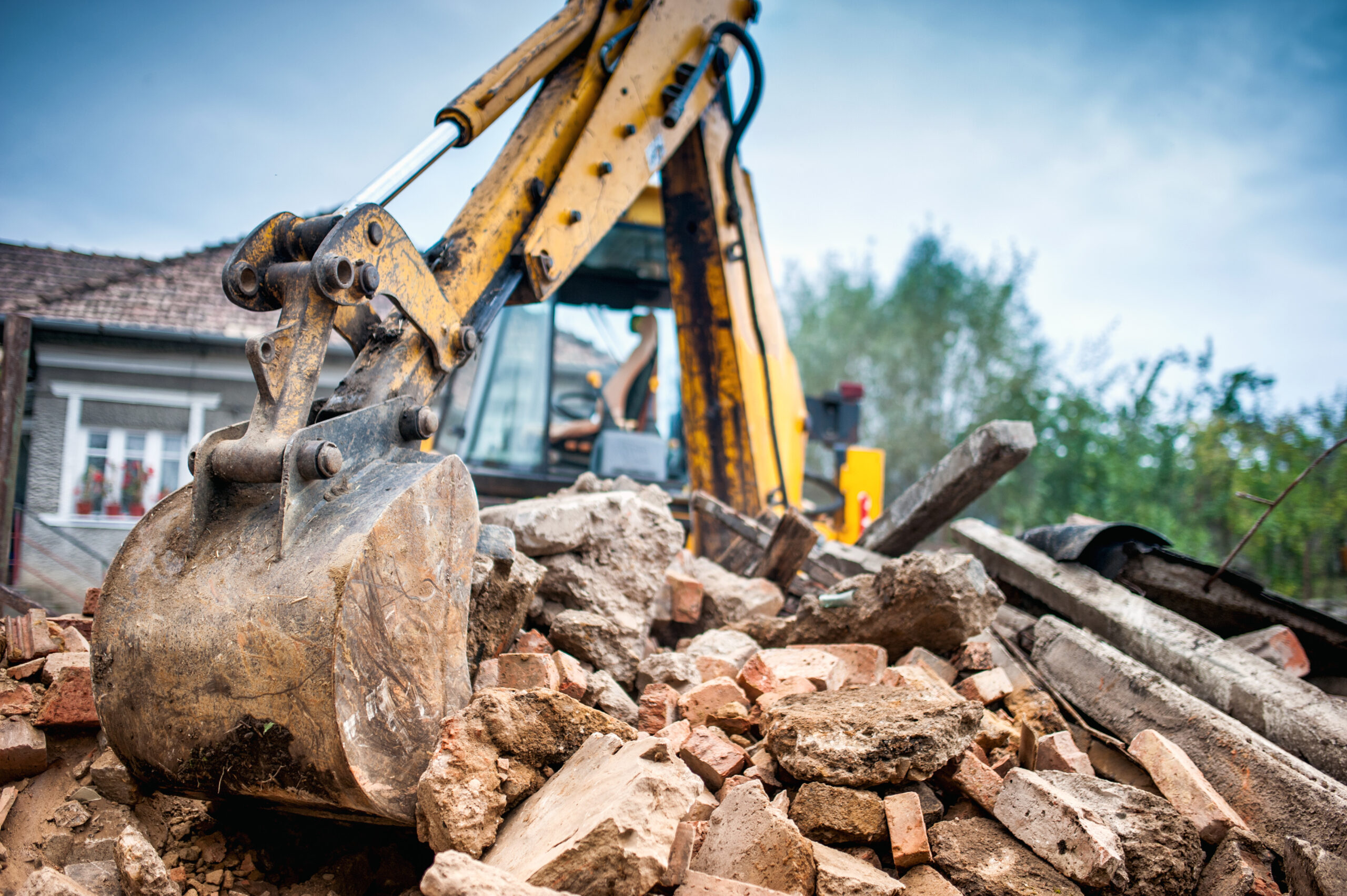 Hydraulic crusher excavator backoe machinery working on site